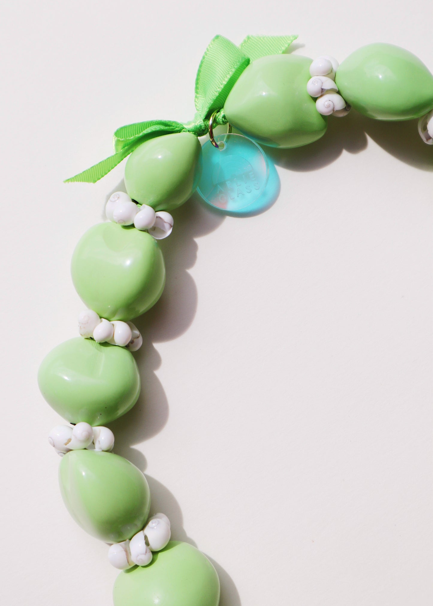 50% OFF - Pakalana Green Kukui Nut Lei with 6 Glass Pua