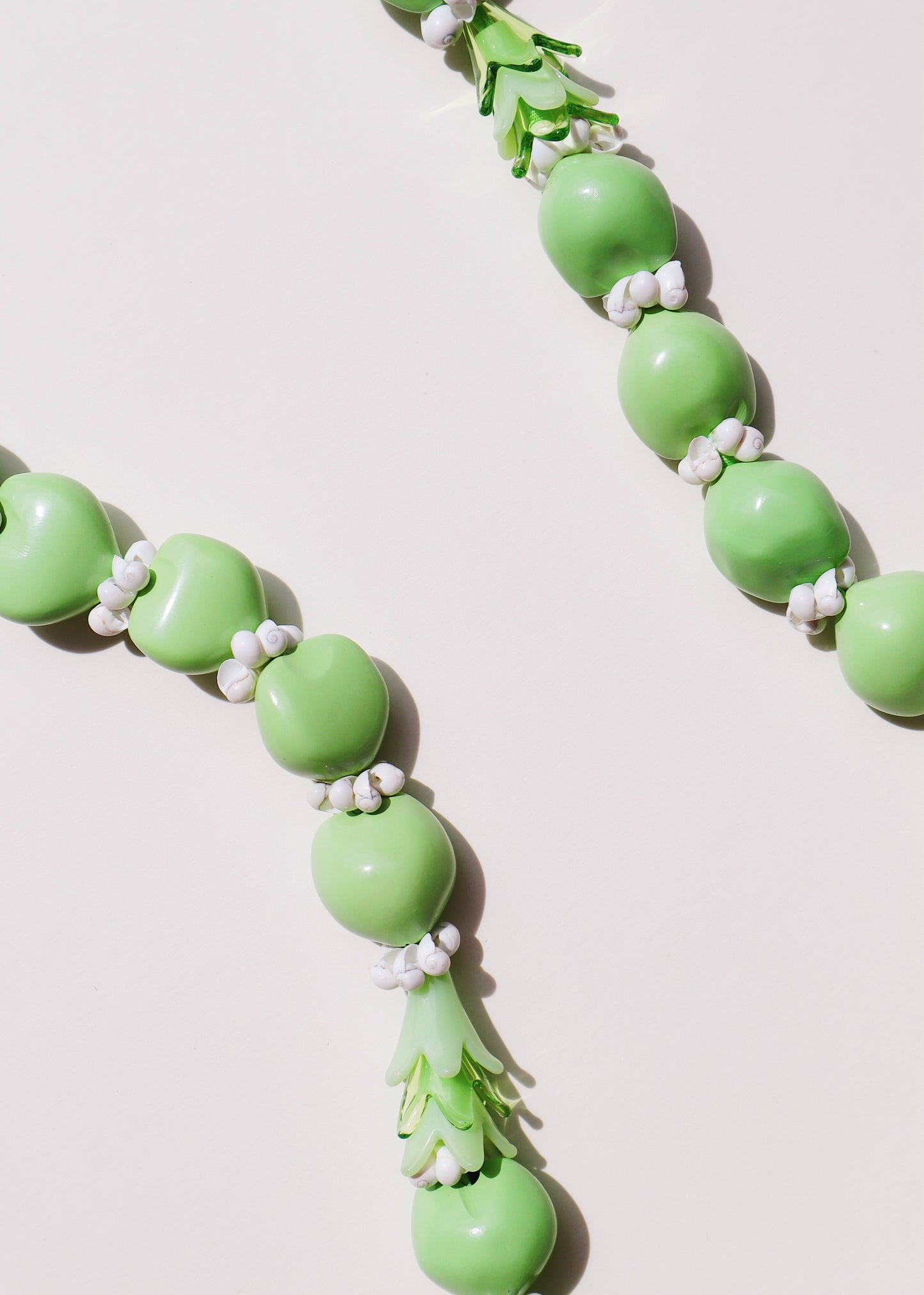 50% OFF - Pakalana Green Kukui Nut Lei with 6 Glass Pua