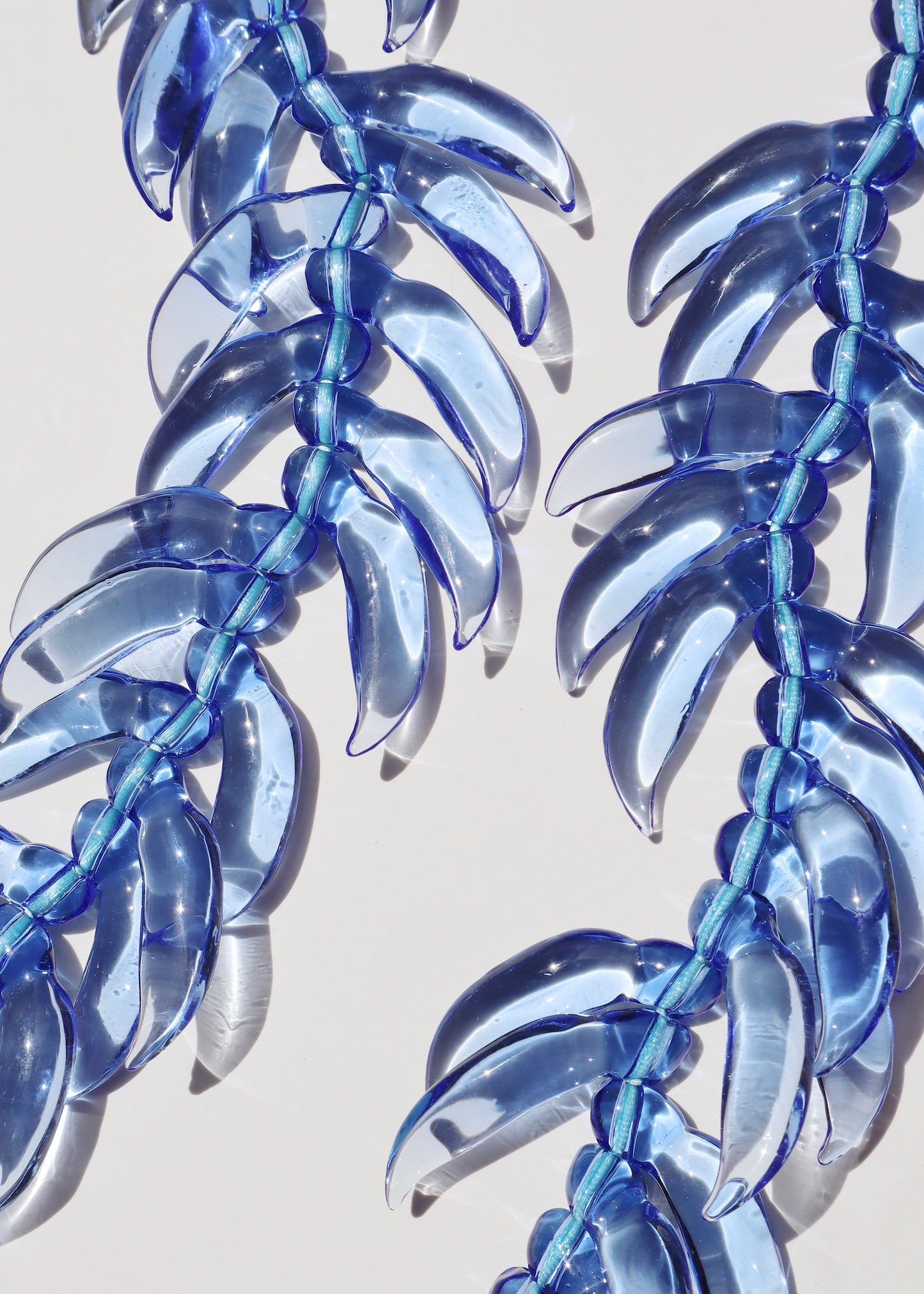 Blue Jade Mongo Shell Lei with 50 Glass Buds