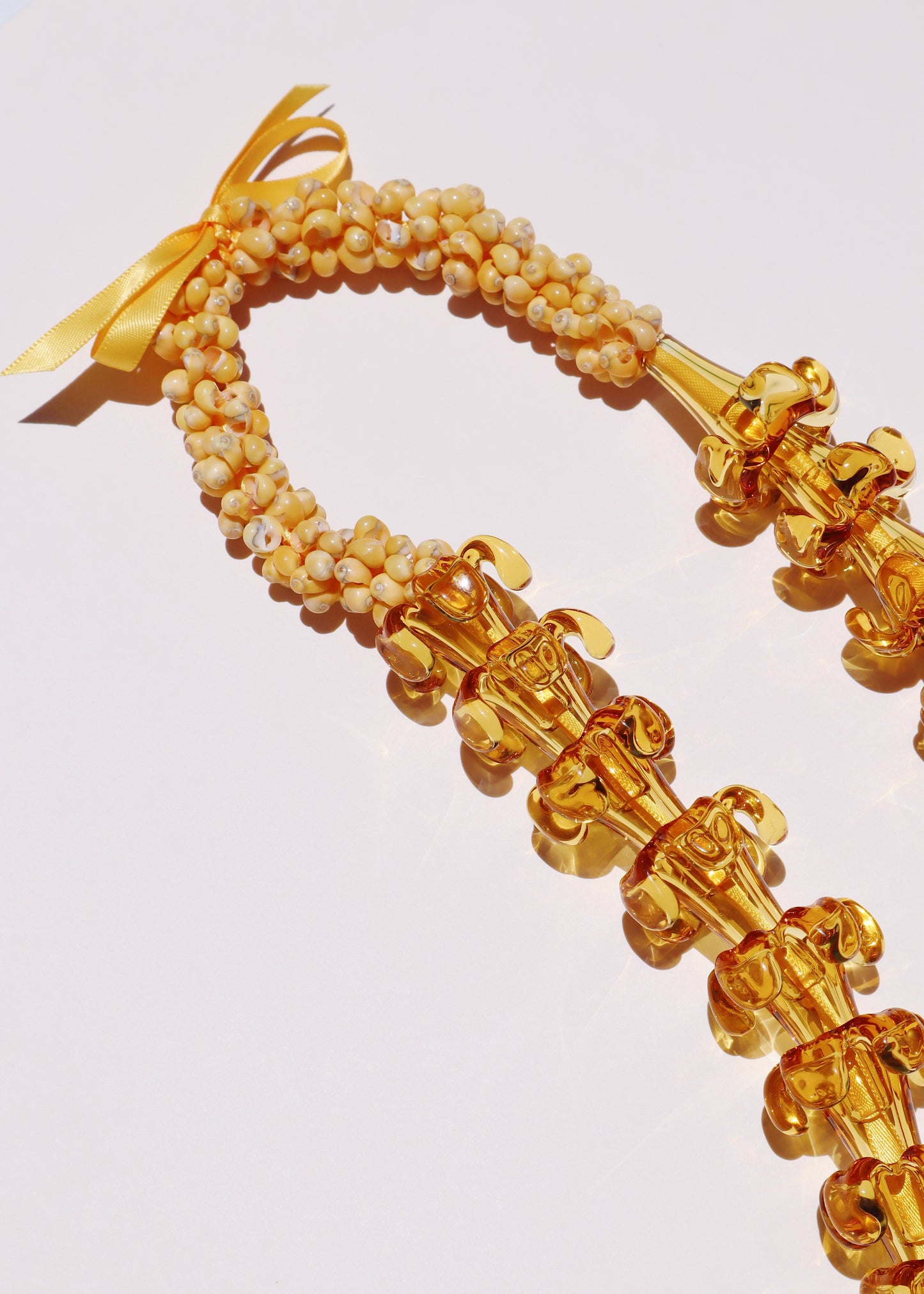 Full Glass Puakenikeni & Mongo Shell Lei with 45 Pua