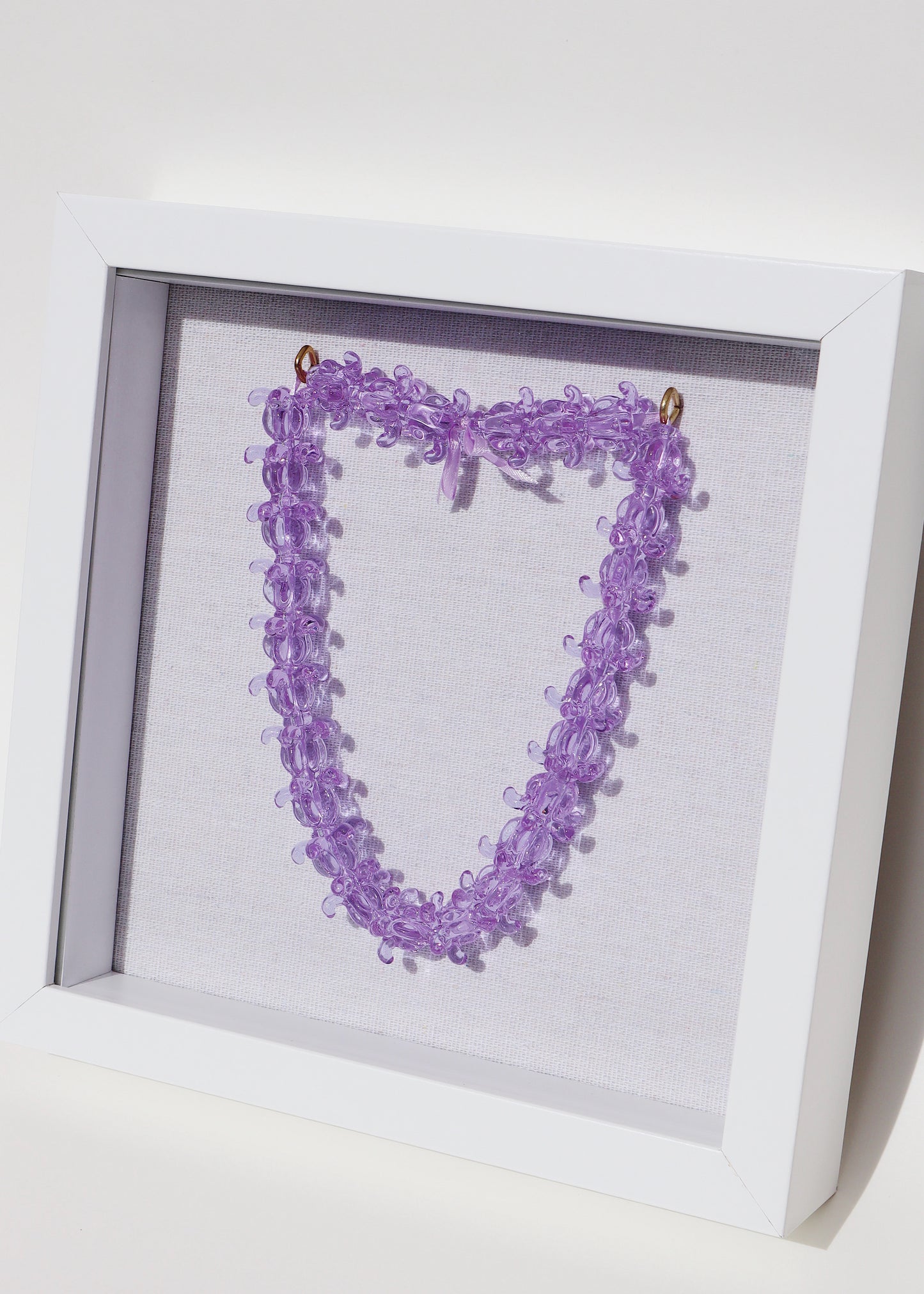 Pua Kalaunu Crown Flower Glass Lei in 9" x 9" Shadowbox