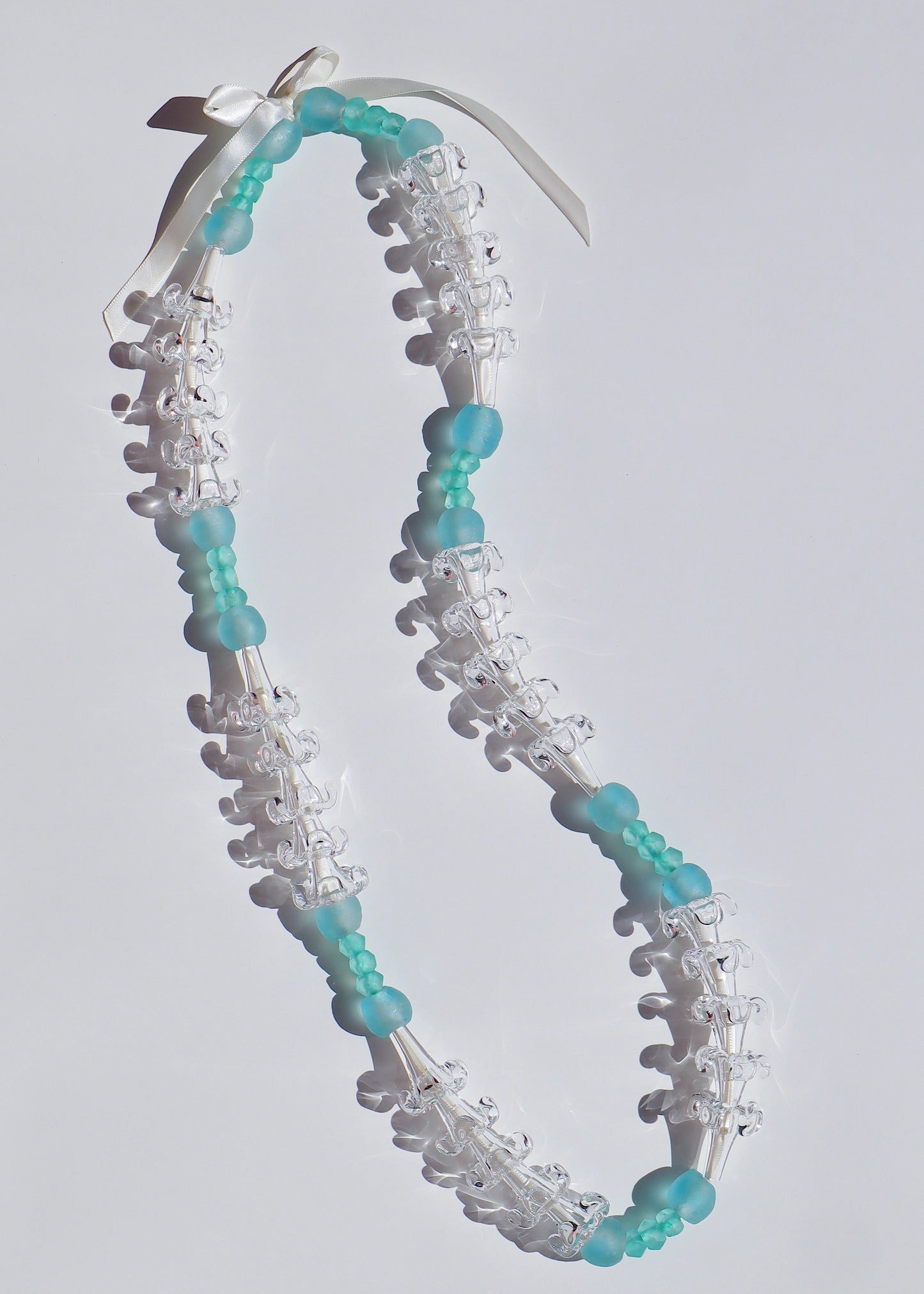 Clear Puakenikeni & Vintage Bead Lei with 30 Glass Pua