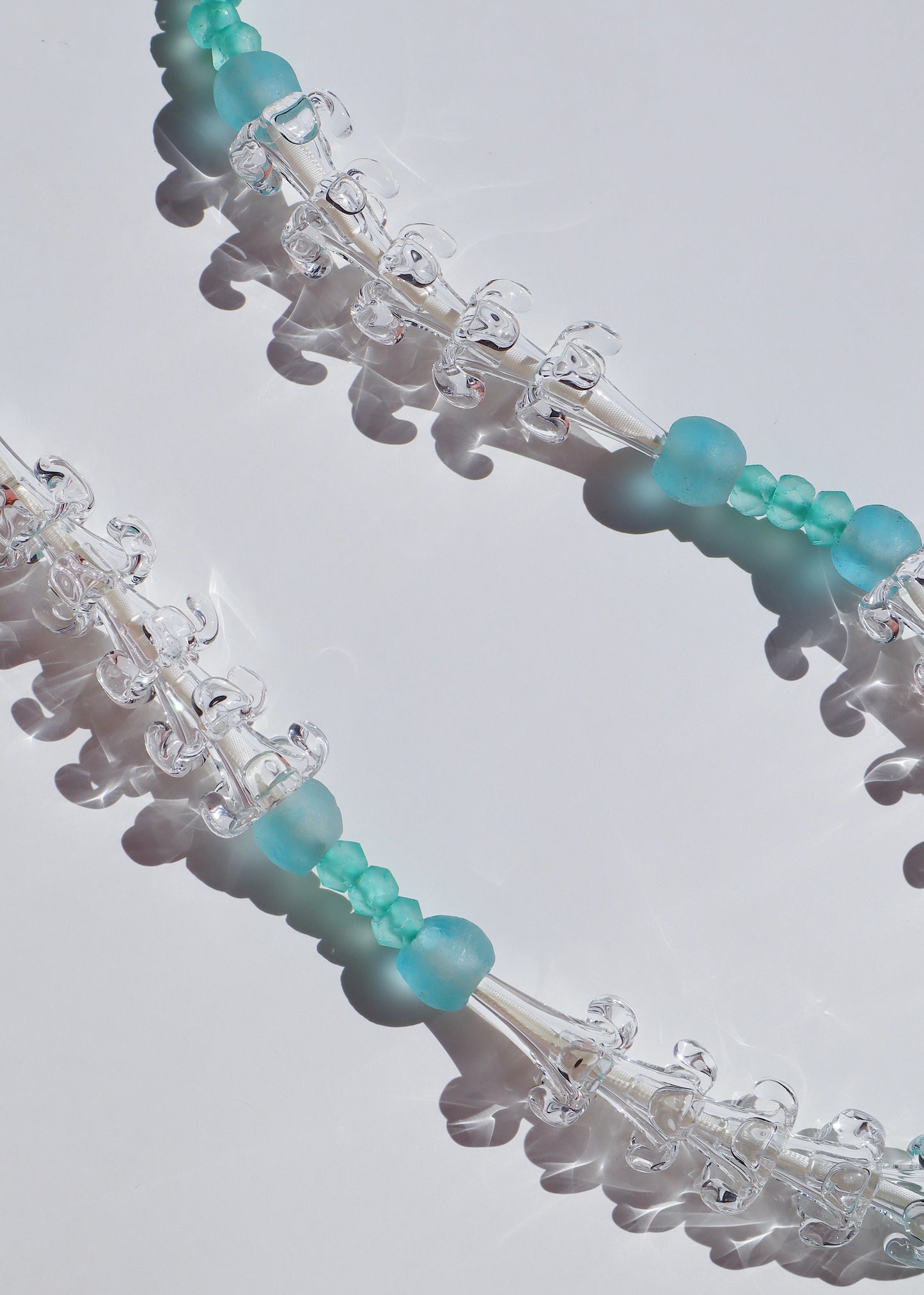 Clear Puakenikeni & Vintage Bead Lei with 30 Glass Pua