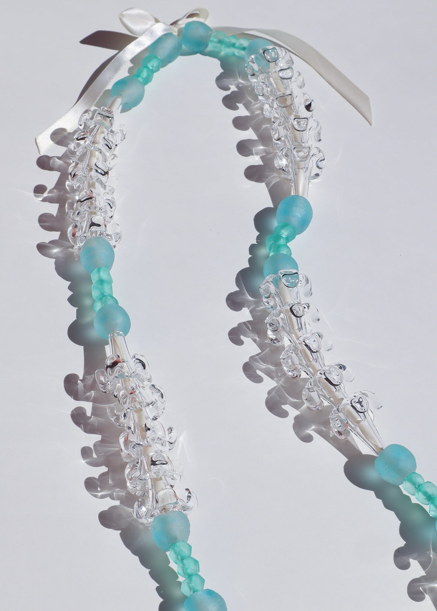 Clear Puakenikeni & Vintage Bead Lei with 30 Glass Pua