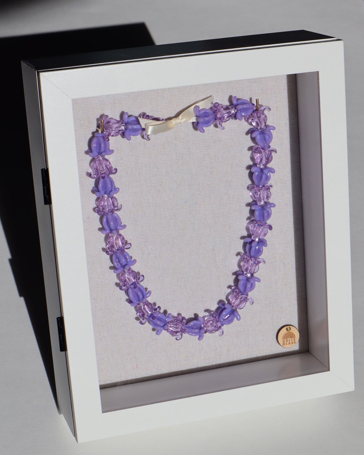 Pua Kalaunu Crown Flower Glass Lei in Shadowbox