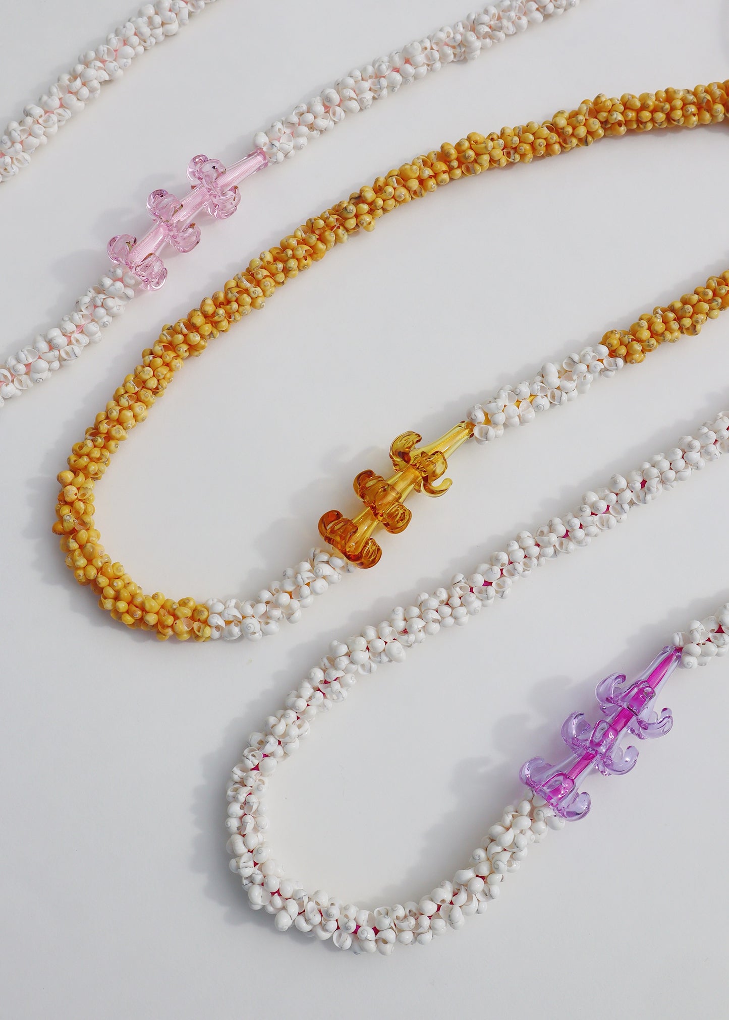 Puakenikeni Mongo Shell Lei with 3 Glass Pua