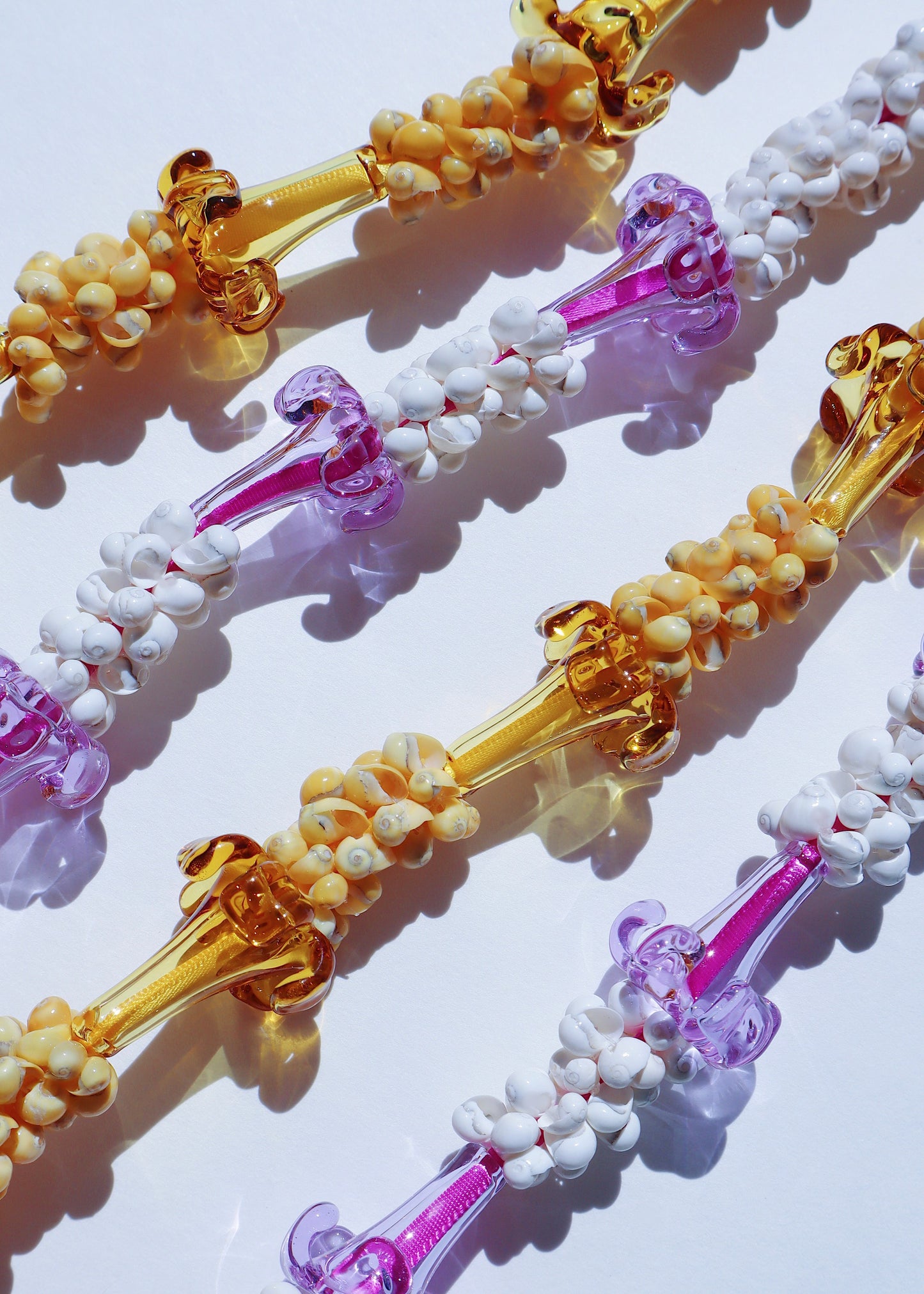 Glass Mongo Shell Lei with 9 Pua
