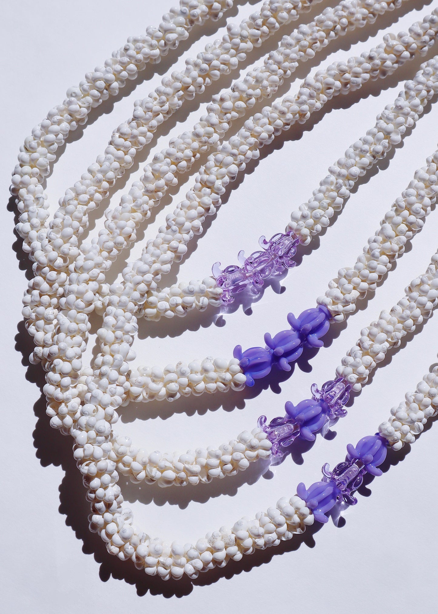 Crown Flower Mongo Shell Lei with 3 Glass Pua
