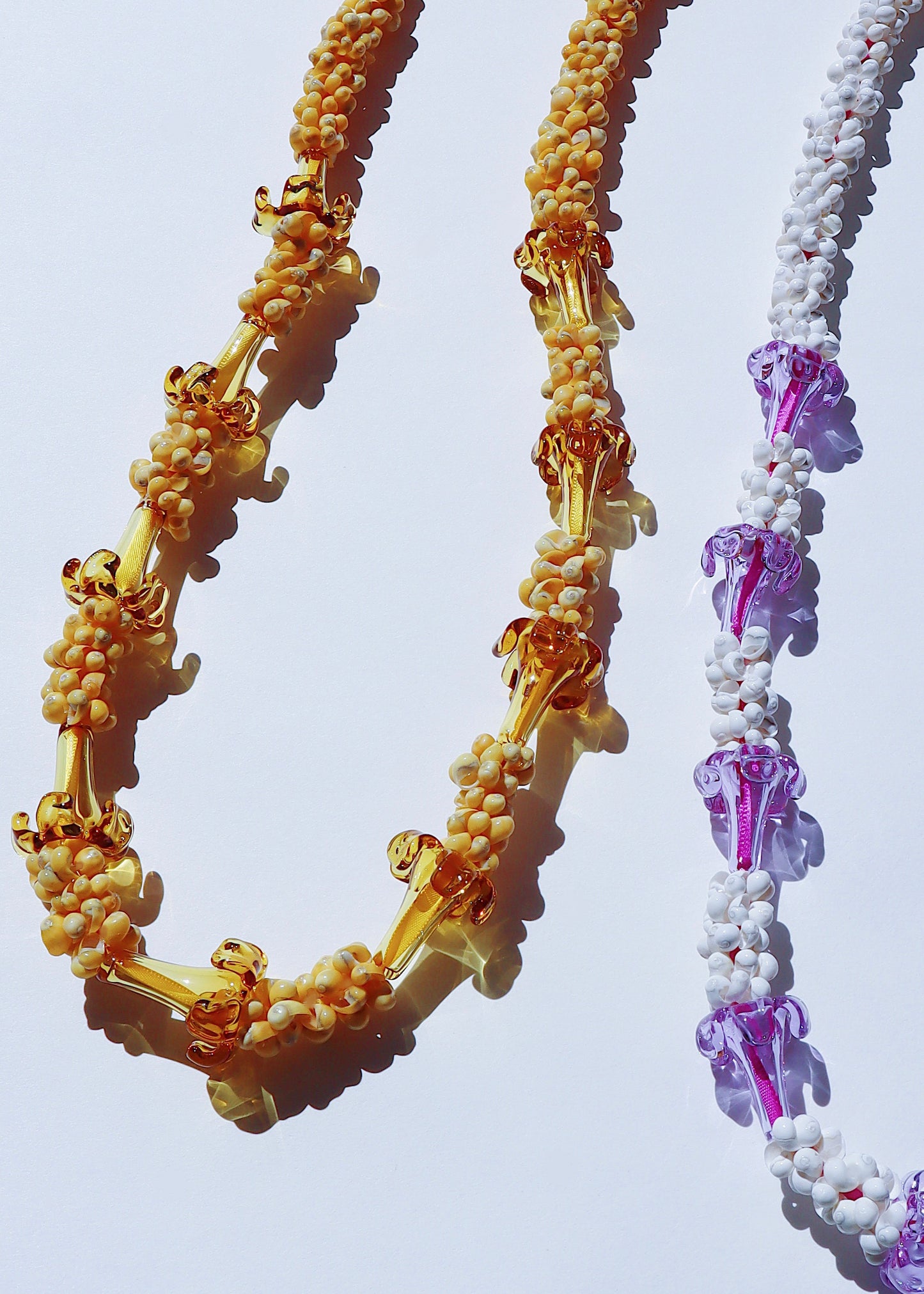 Glass Mongo Shell Lei with 9 Pua