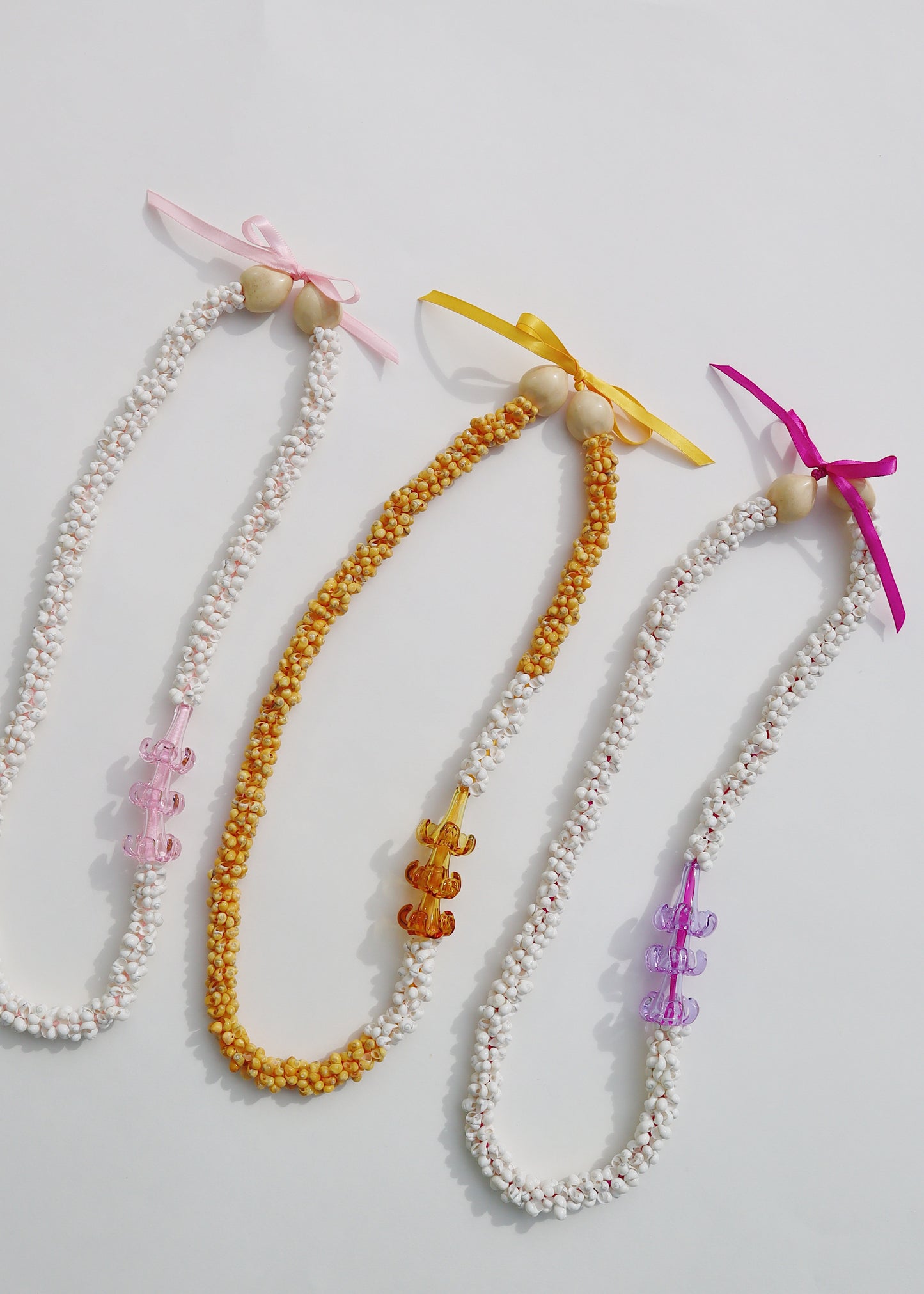 Puakenikeni Mongo Shell Lei with 3 Glass Pua