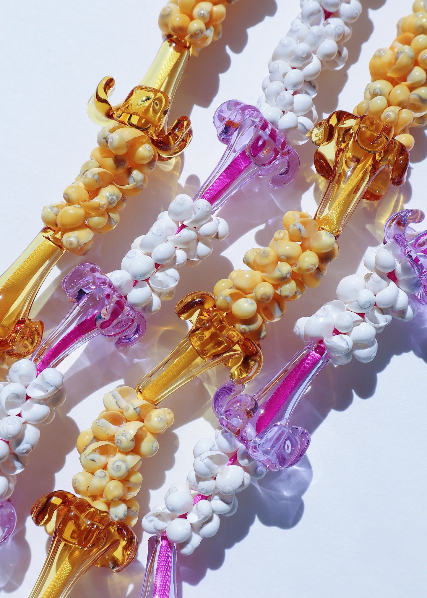 Glass Mongo Shell Lei with 9 Pua