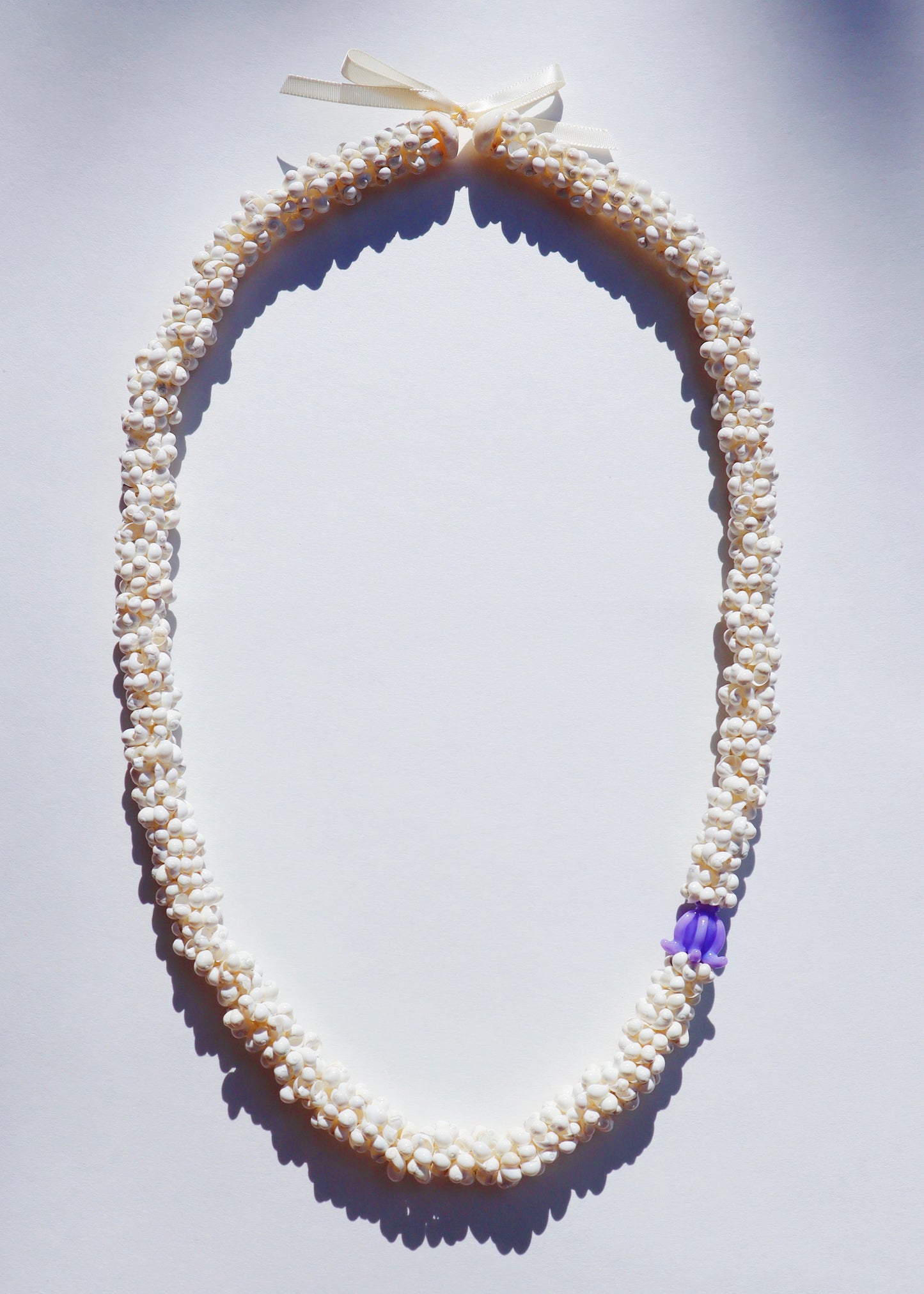 Crown Flower Mongo Shell Lei with 1 Glass Pua