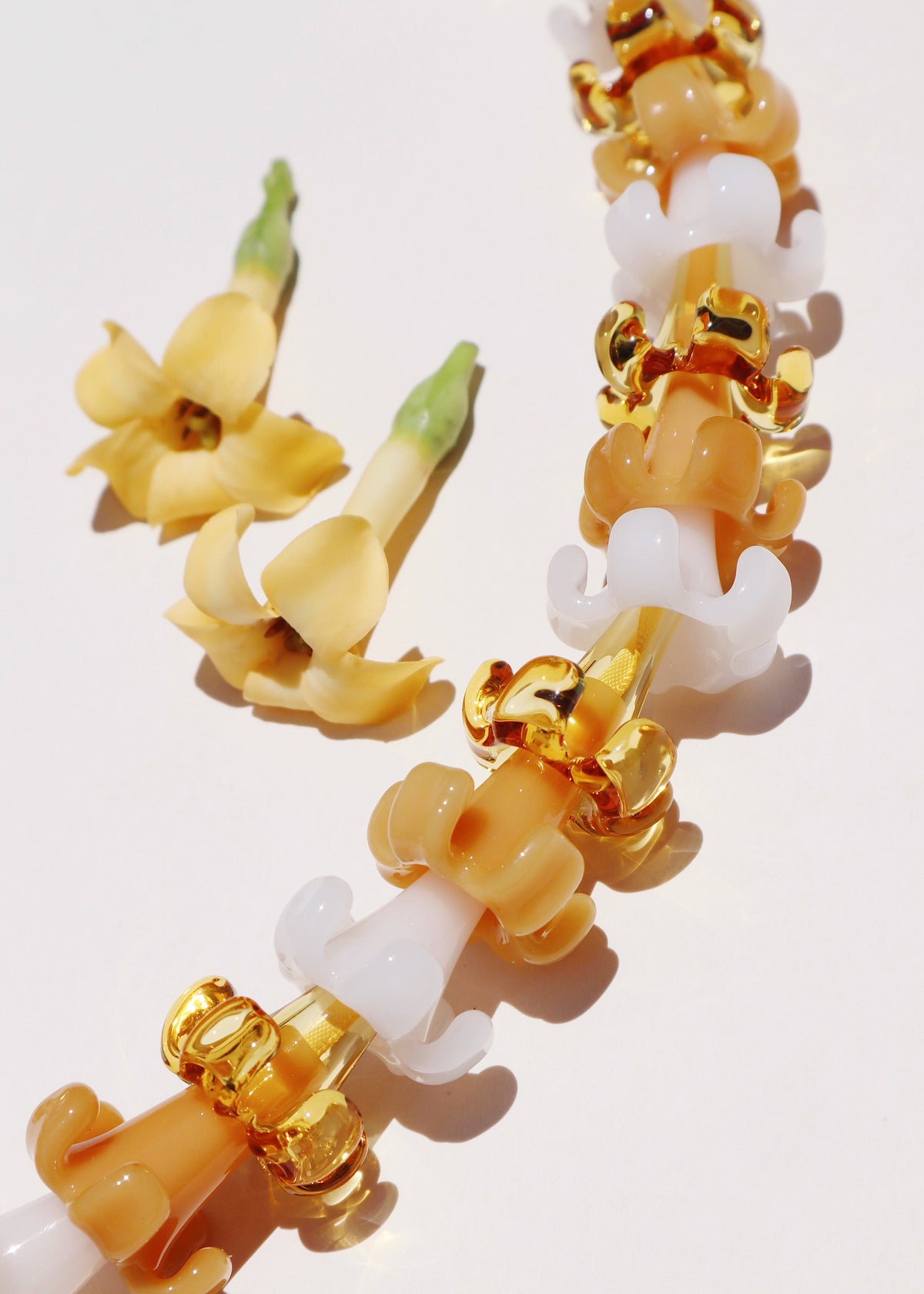 Handmade glass puakenikeni flower by Arlie Glass, Oʻahu