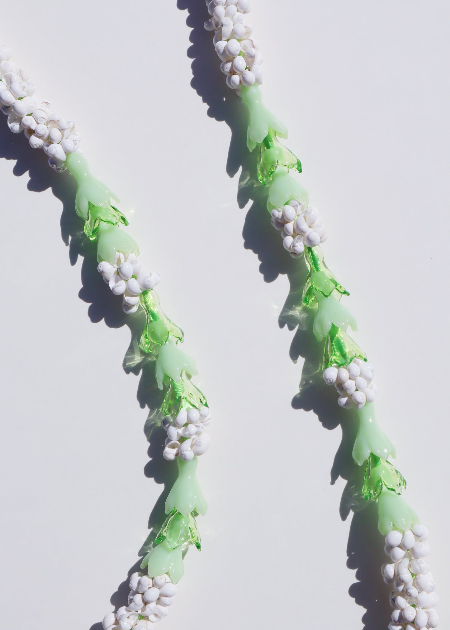 Pakalana Mongo Shell Lei with 18 Glass Pua