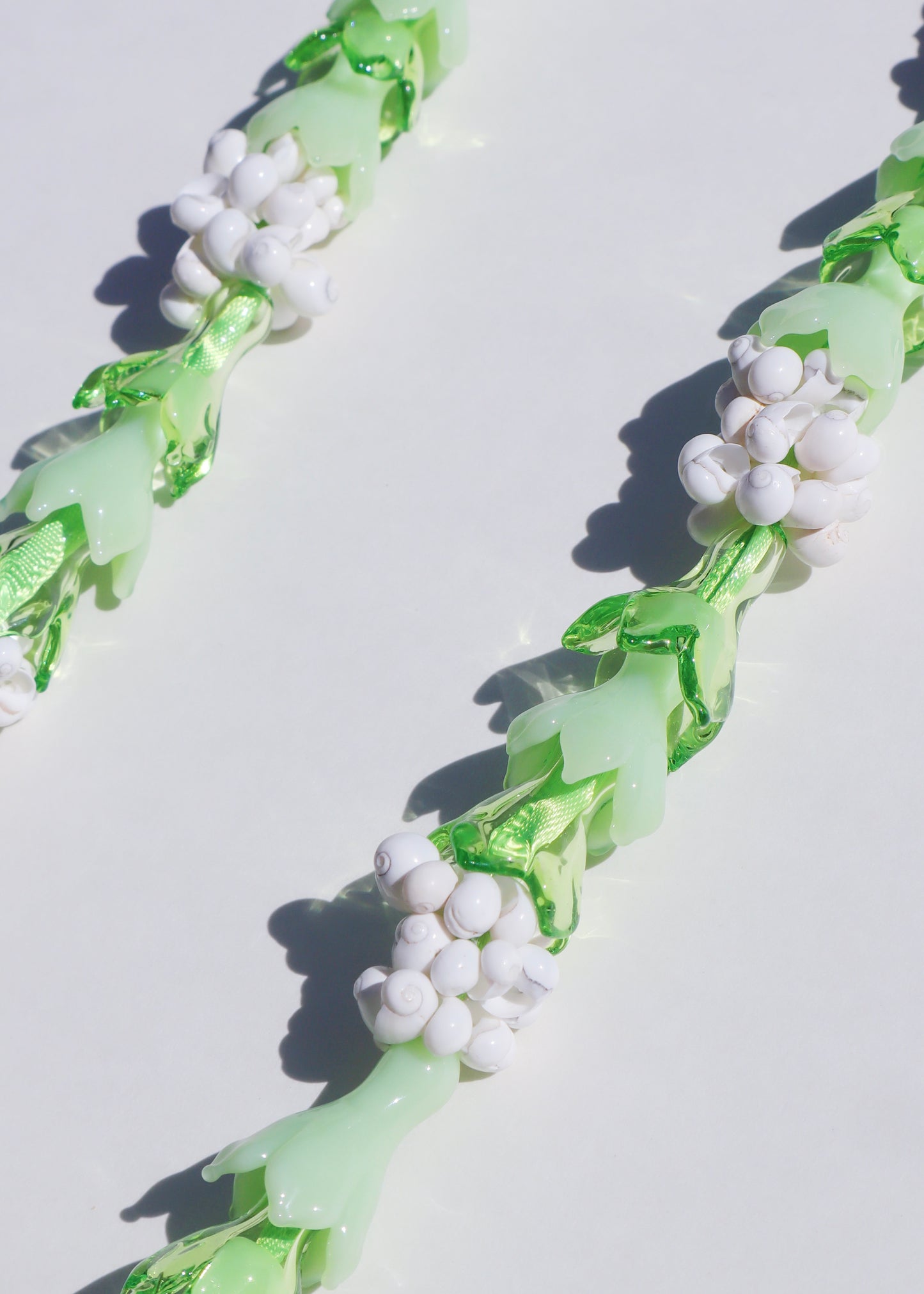 Pakalana Mongo Shell Lei with 18 Glass Pua
