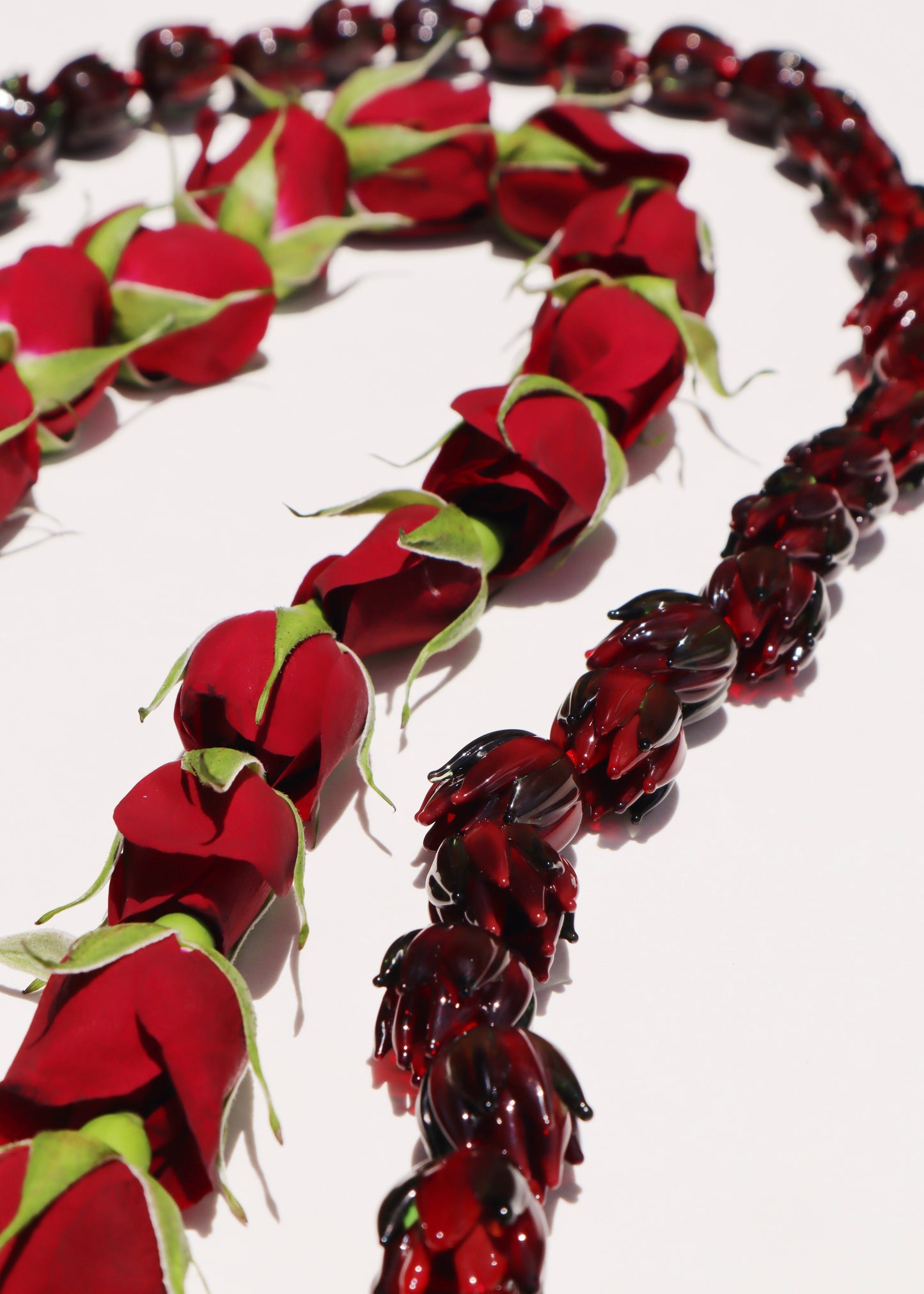 Full Glass Lokelani Rose Lei with 62 Pua