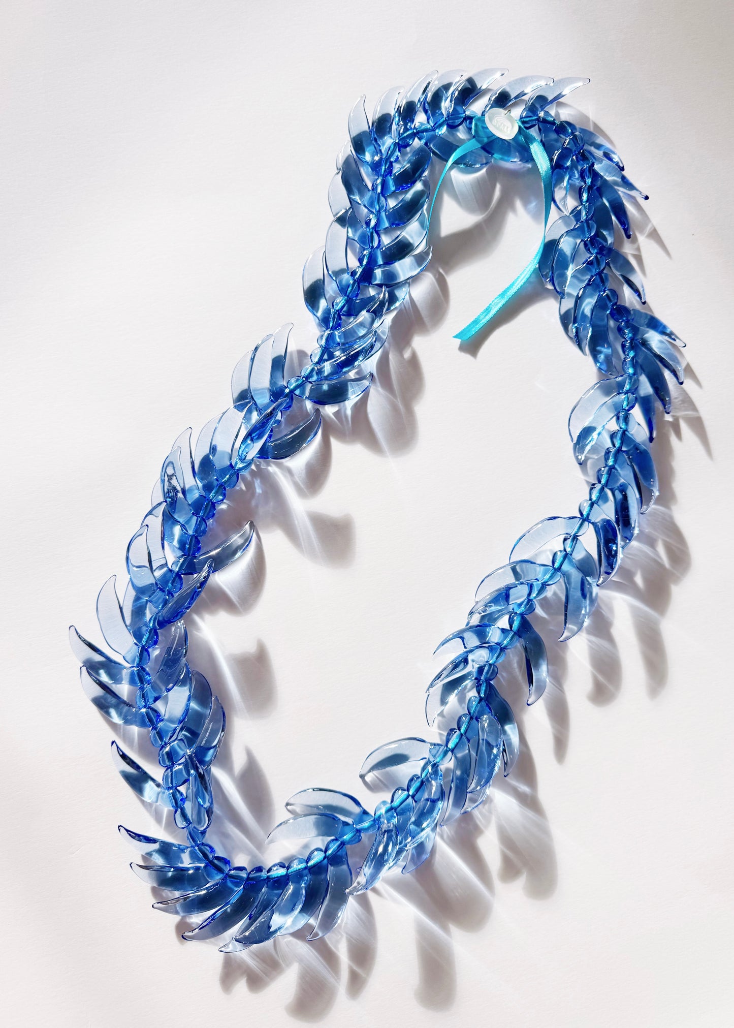 Blue Jade Lei in Full Glass