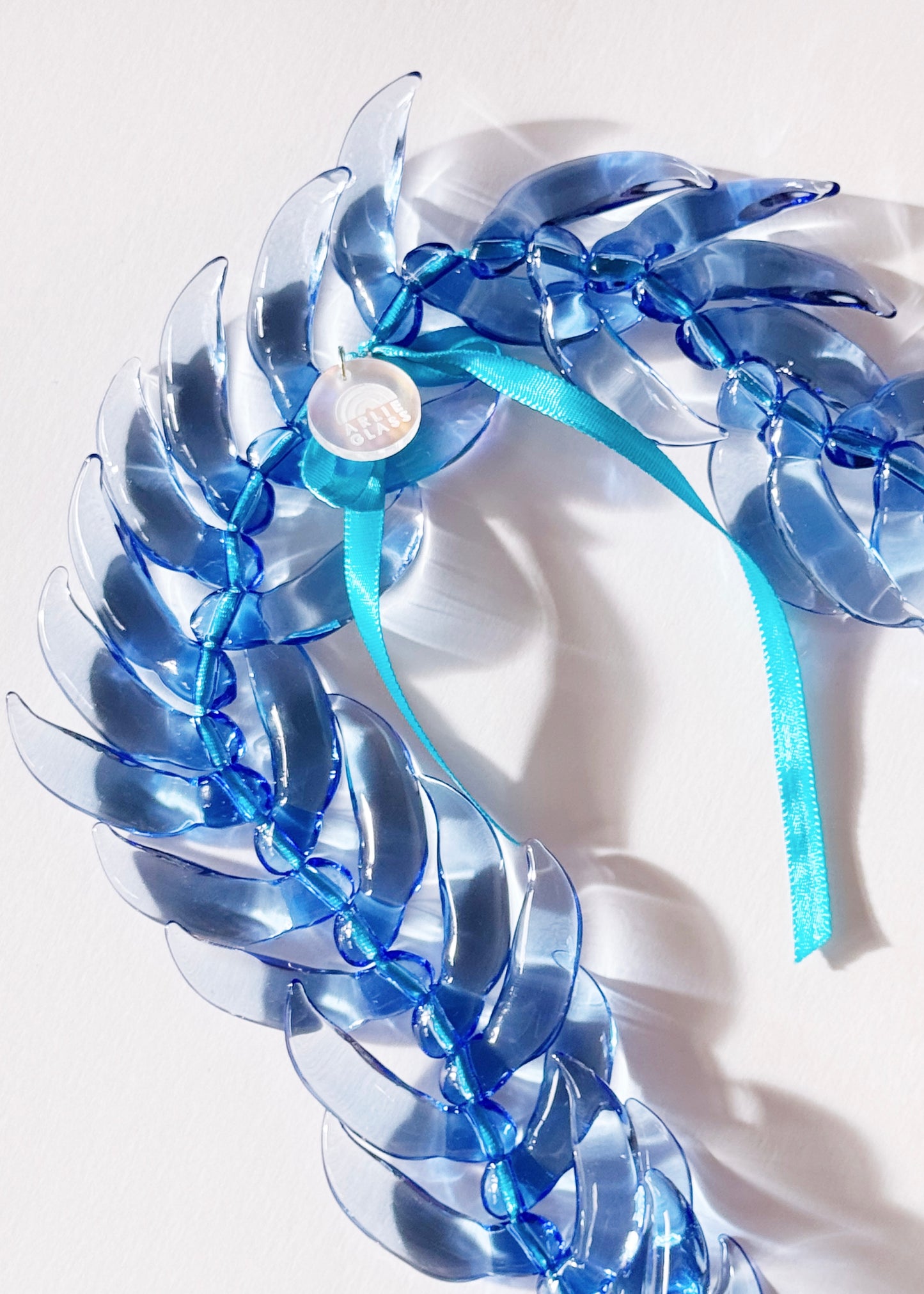 Blue Jade Lei in Full Glass