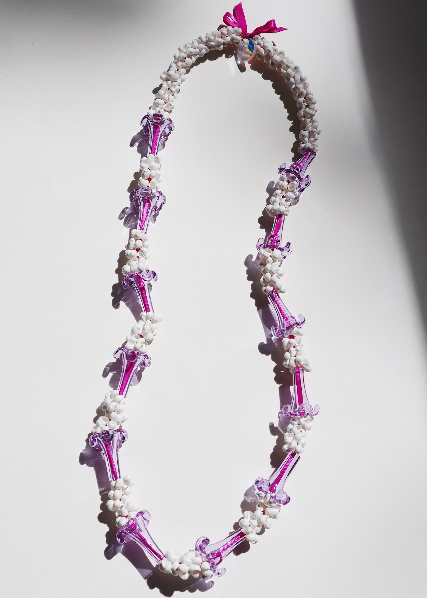 Perfectly Imperfect 40% OFF - Purple Glass Puakenikeni Mongo Shell Lei with 12 Pua