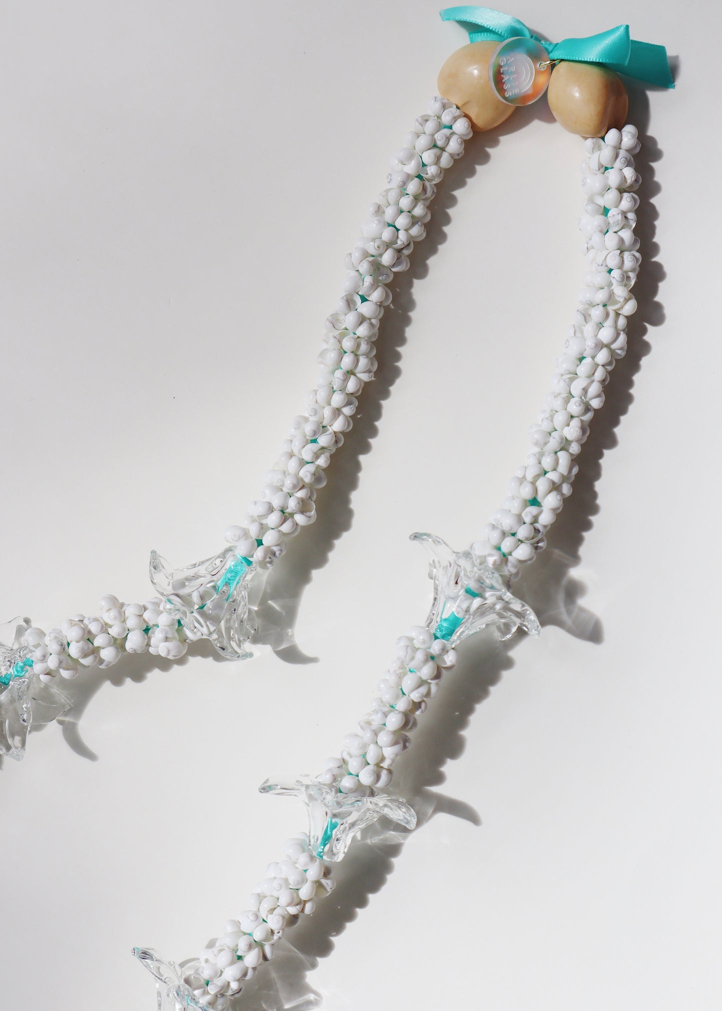 Perfectly Imperfect 40% OFF - Clear Glass Pua Melia Plumeria Mongo Shell Lei with 11 Pua