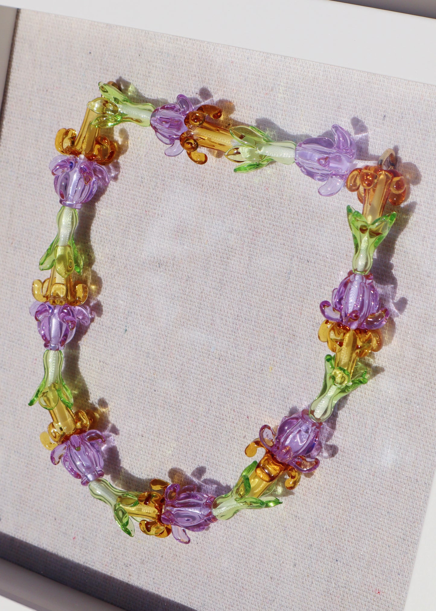 Perfectly Imperfect 40% OFF - Crown Flower, Pakalana & Puakenikeni Glass Lei in 9" x 9" Shadowbox