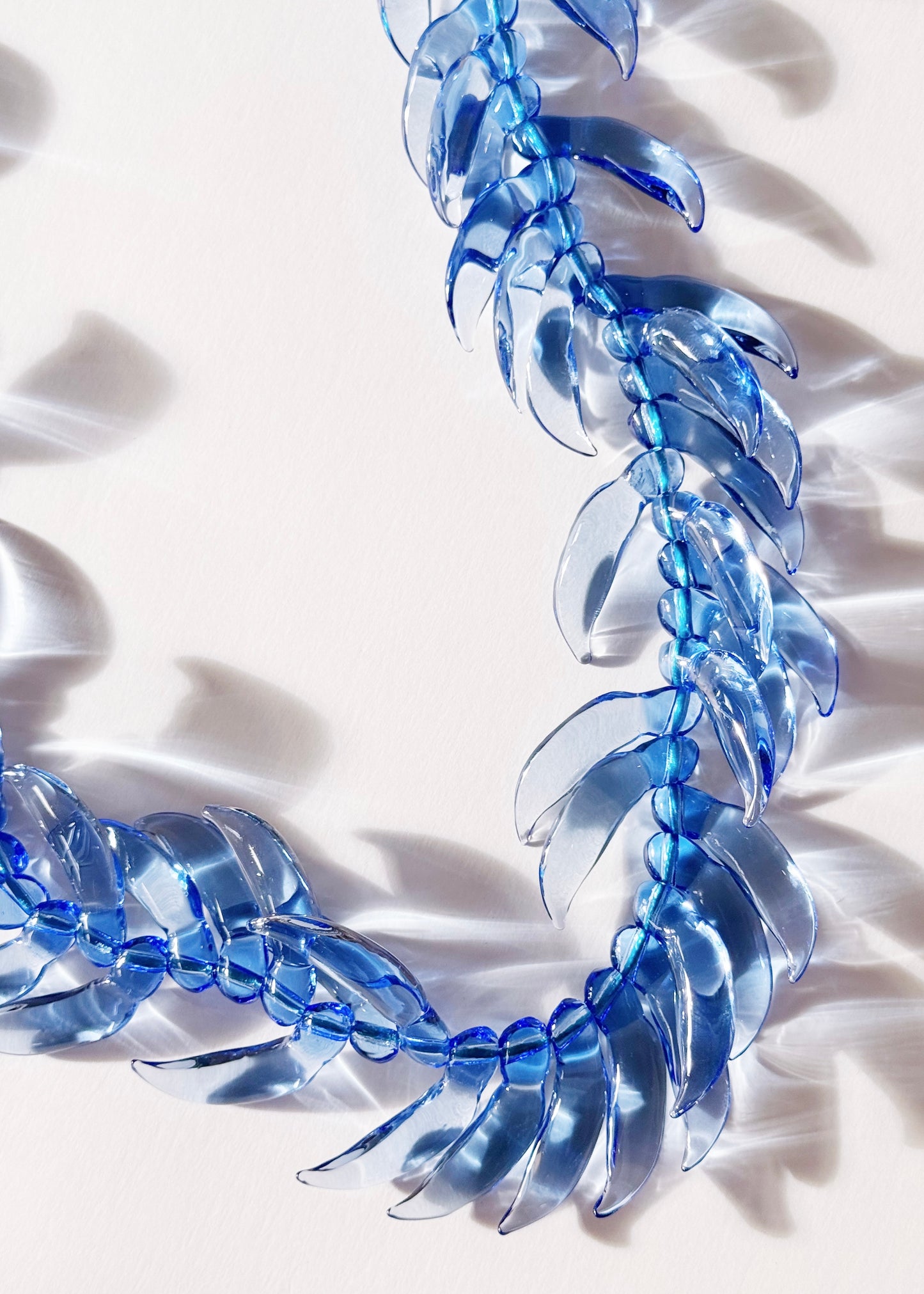 Blue Jade Lei in Full Glass