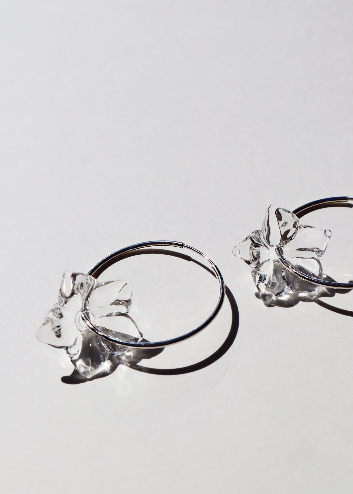 Perfectly Imperfect 35% OFF - Pua Melia Plumeria Sterling Silver Hoop Earrings Clear