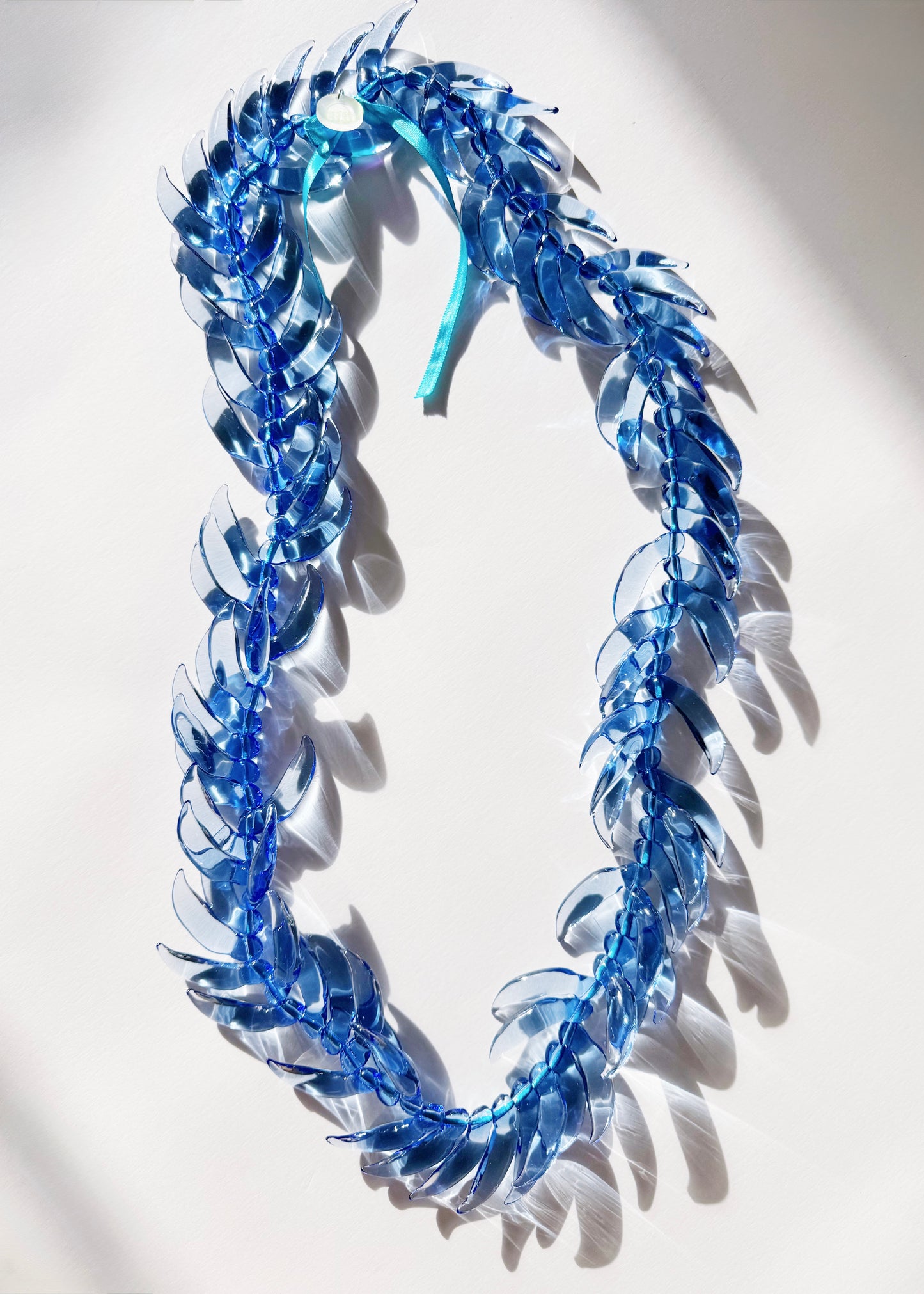 Blue Jade Lei in Full Glass