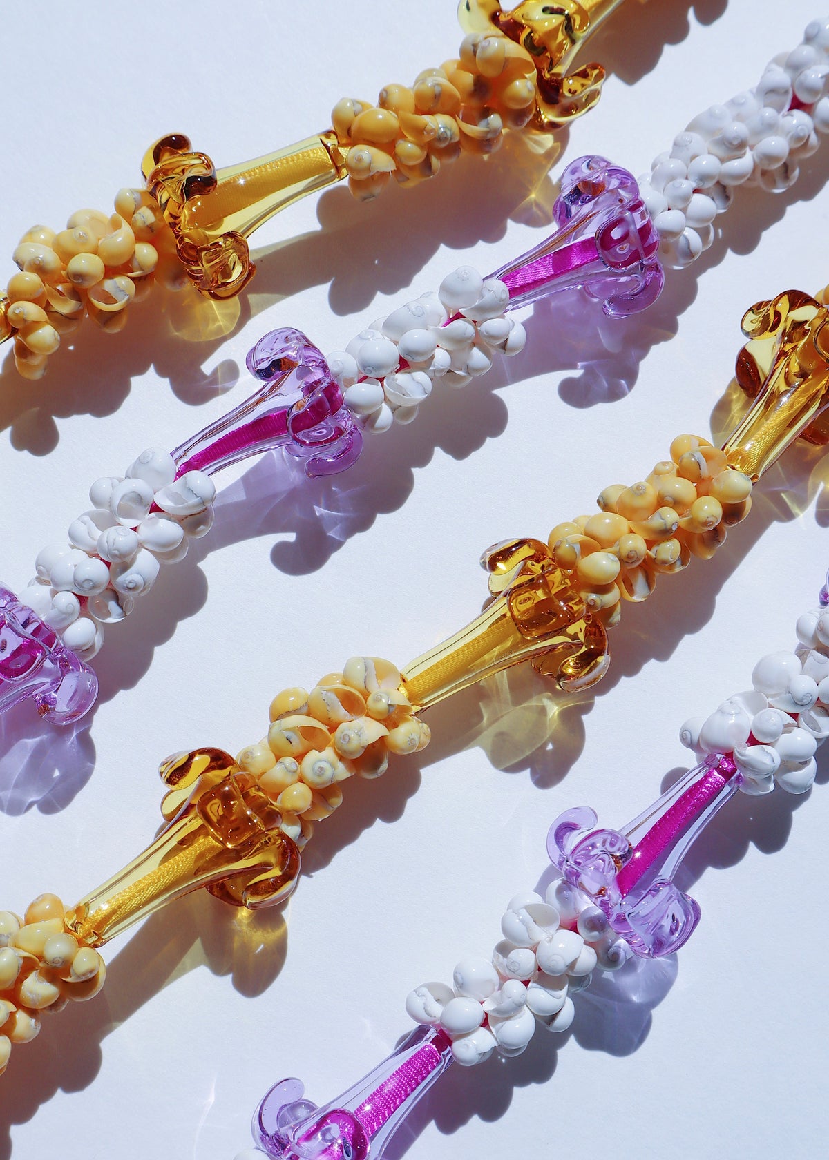 Glass Mongo Shell Lei with 9 Pua