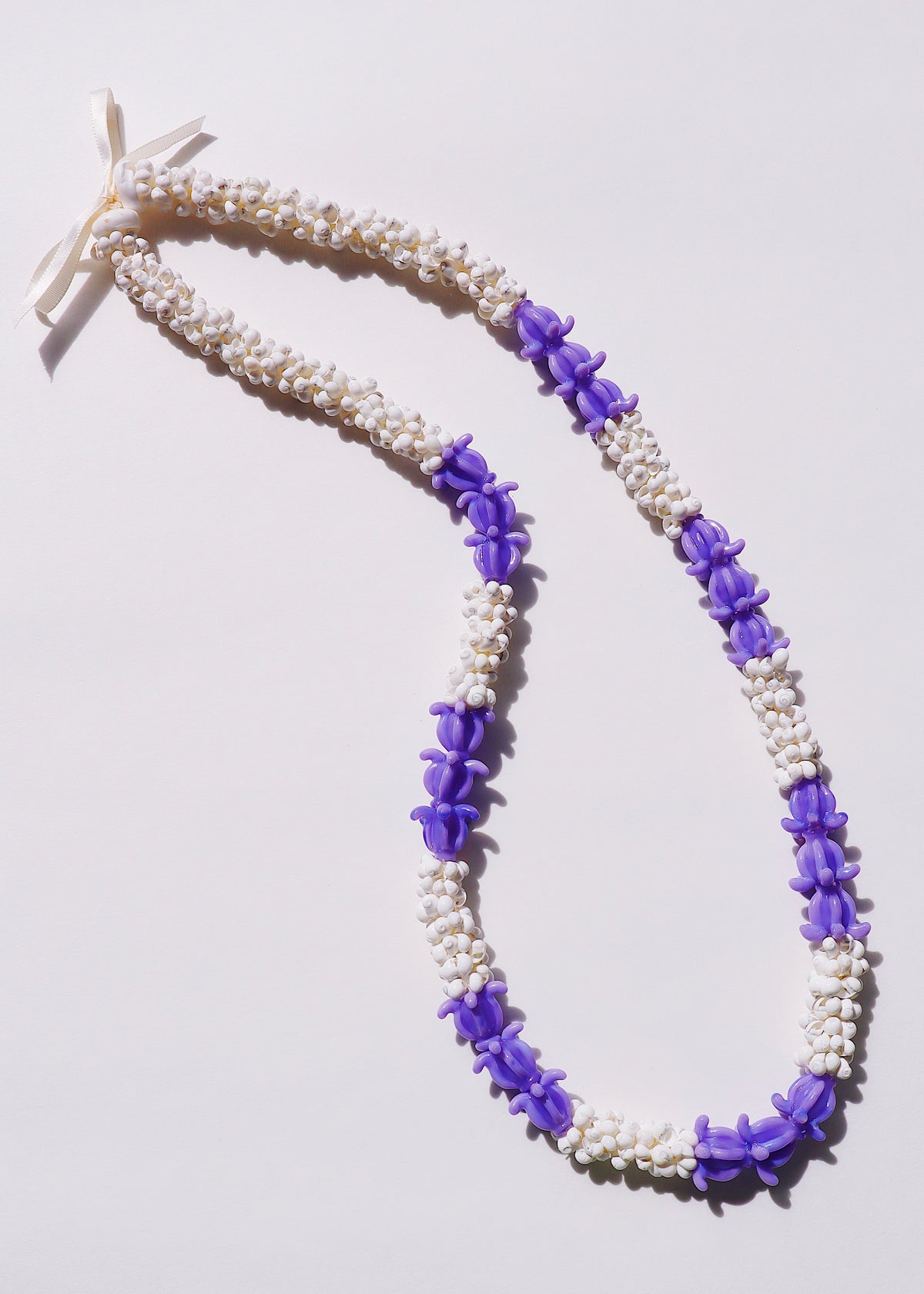 Crown Flower Mongo Shell Lei with 21 Glass Pua