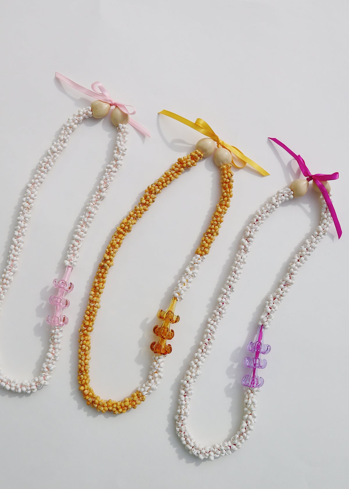 Puakenikeni Mongo Shell Lei with 3 Glass Pua