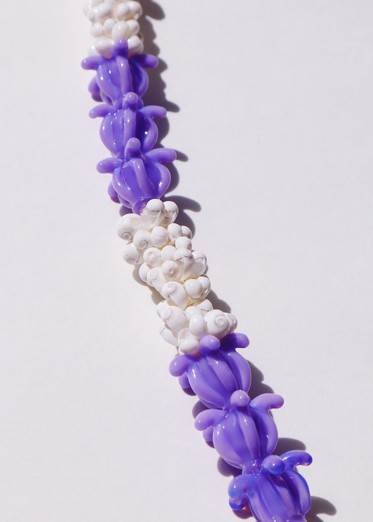 Crown Flower Mongo Shell Lei with 21 Glass Pua